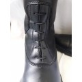 Bottes en simili-cuir noires