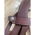 Bride Antarès taille poney muserolle renforcée + 1 paire de rênes